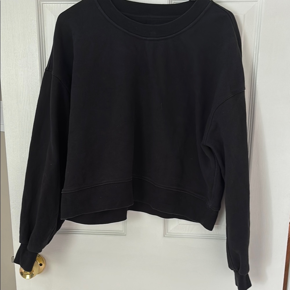Lululemon black crewneck.